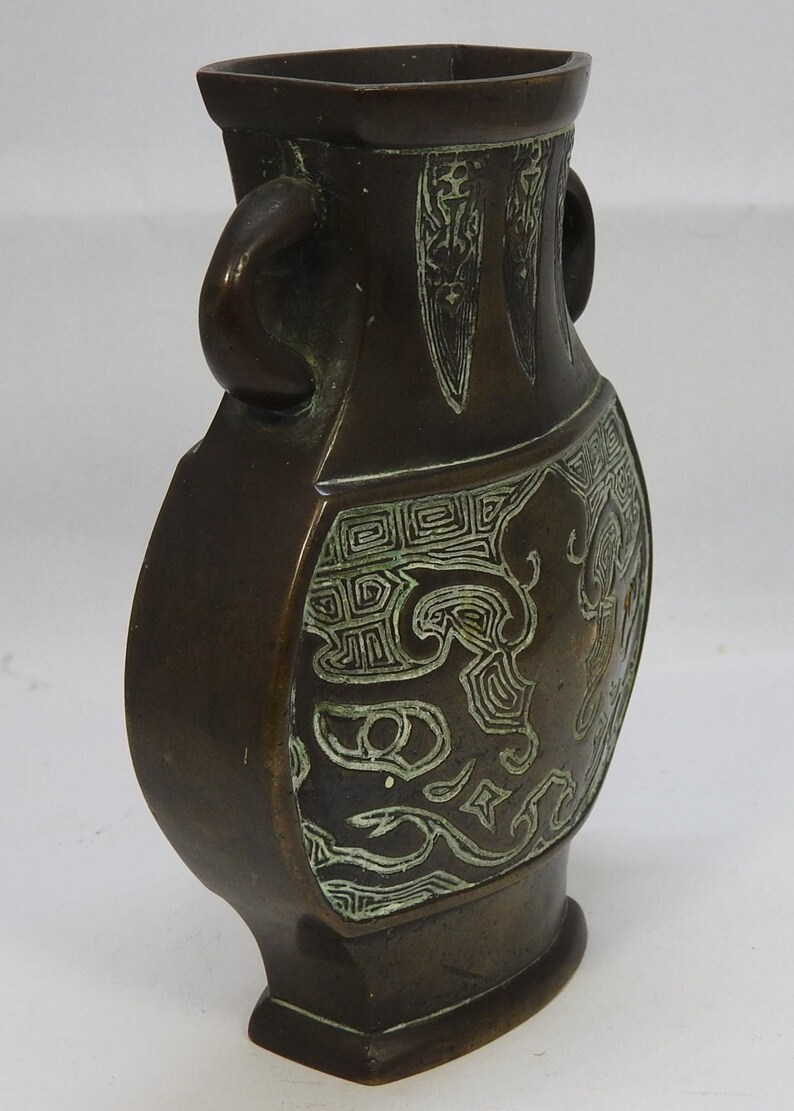 Bronze vase with twin handles