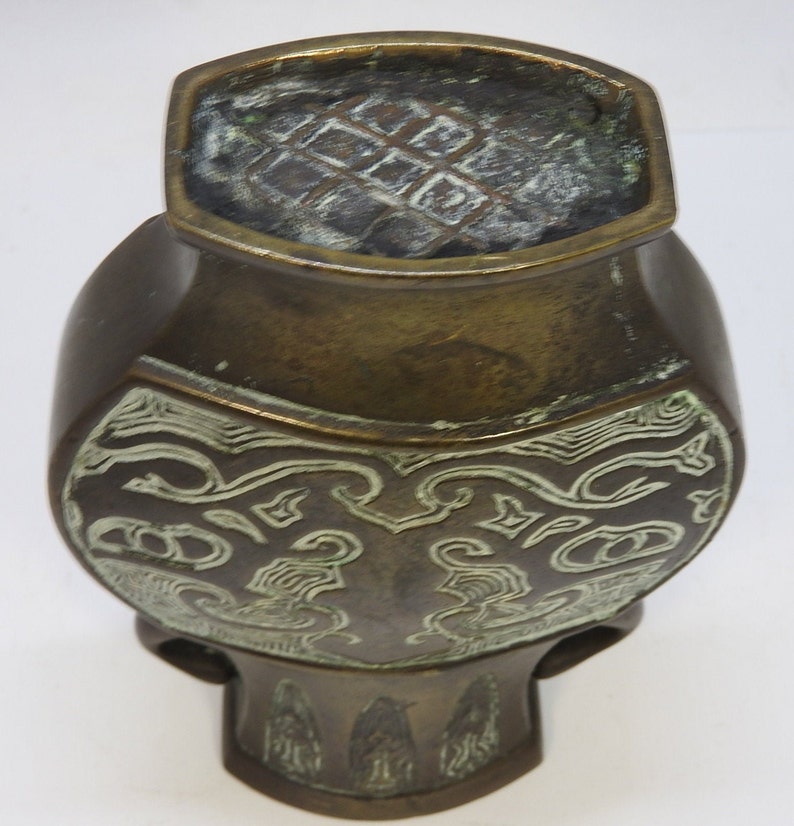 Bronze vase with twin handles
