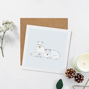 Arctic Foxes Carte de Noël illustrée 148x148mm