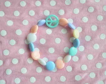 Pulseira de miçangas pastel