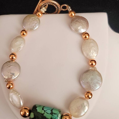 Coin Pearl bracelets shops with green natural turquoise and copper design and made by Veronica Yellowhorse Navajo Dine' absolutely gorgeous
