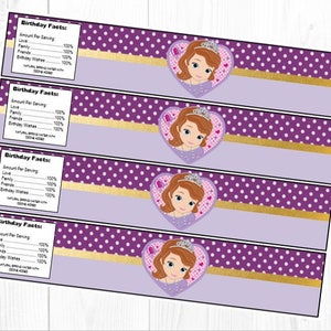 May include: Four purple and white polka dot labels with a gold stripe and a heart-shaped image of a princess with brown hair and a crown. The text on the labels reads "Birthday Facts: Amount Per Serving: Love 100%, Family 100%, Friends 100%, Wishes 100%, Birthday Wishes 100%"