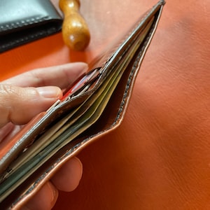handmandeLeather bifold wallet