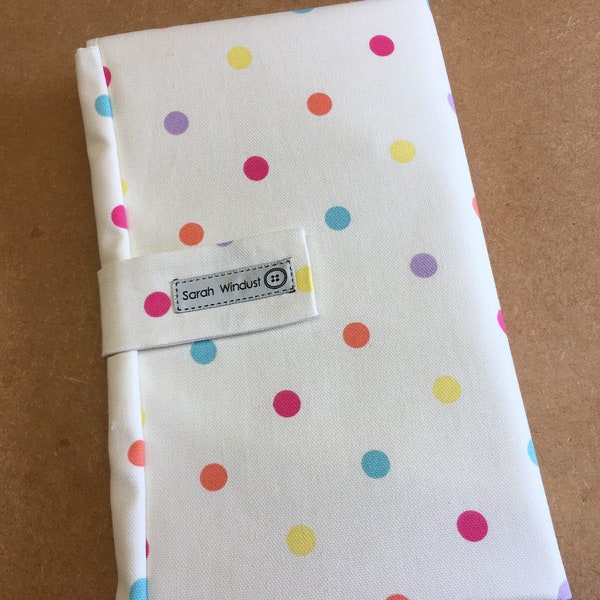 Bright Spotty Changing Mat with pockets, diaper bag, nappy wallet.