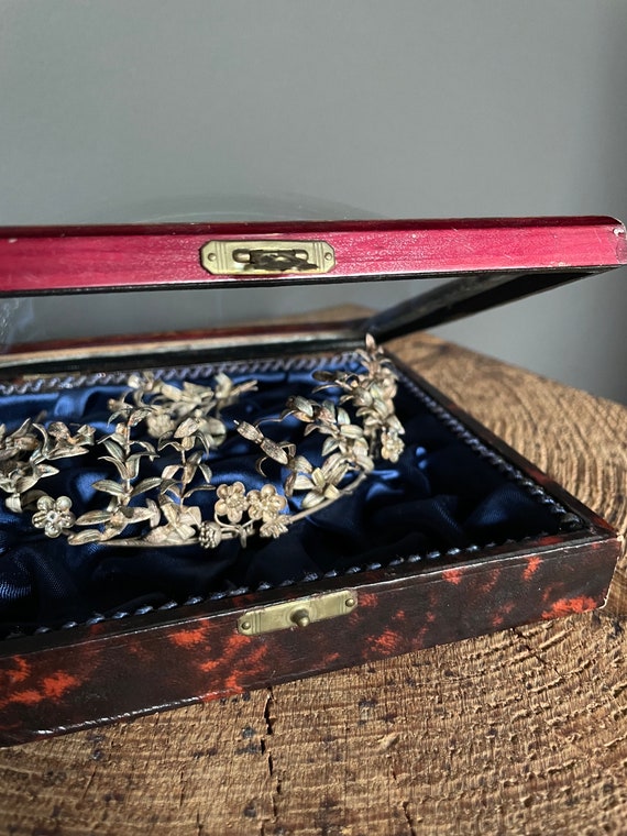 silver vintage tiara in antique jewelry box, tiara