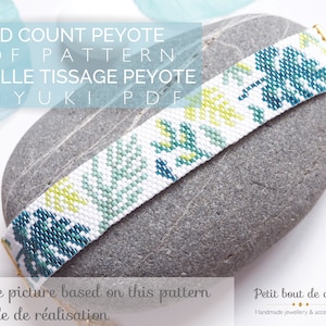 May include: A white, blue, and green beaded bracelet with a leaf pattern. The bracelet is on a gray rock. The text "ODD COUNT PEYOTE PDF PATTERN GRILLE TISSAGE PEYOTE MIYUKI PDF" is above the bracelet. The text "Sample picture based on this pattern Exemple de réalisation" is below the bracelet. The text "Petit bout de chou Handmade jewellery & accessories" is in the lower right corner.