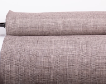 Medium weight 100% pure linen fabric with a checked Prince of Wales check pattern. Pre-washed, suitable for clothing. Sold by the yard
