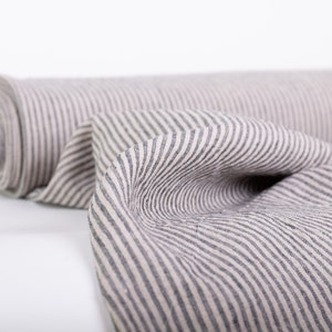 Medium weight, washed, dense, and durable flax fabric in a striped pattern. Linen fabric sold by the yard for sewing or crafting projects