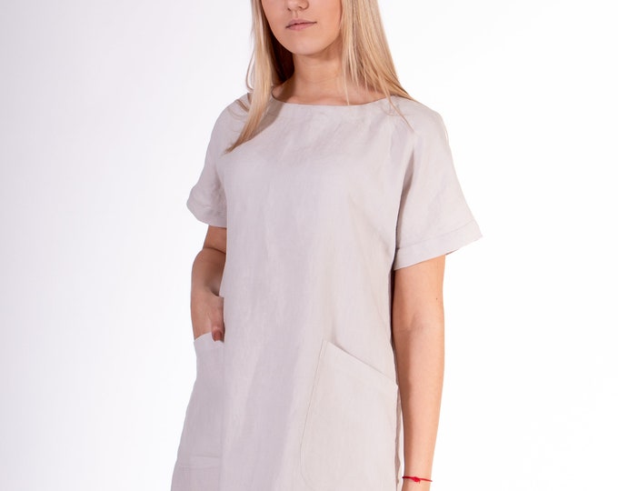 LinenBuy Pure 100% linen dress. Light silver color. Midi dress with front pockets. The top part -  tie closure at the back.