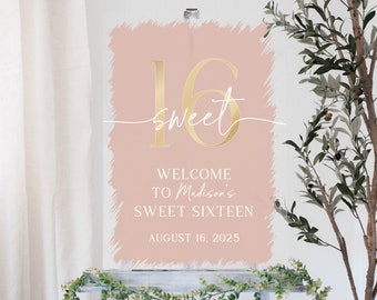 May include: A pink and gold welcome sign for a Sweet Sixteen party. The sign features the number 16 in gold with the word "sweet" written in cursive. The text reads "Welcome to Madison's Sweet Sixteen August 16, 2025".