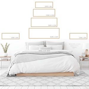 May include: A mockup of a king-size bed with a white duvet and pillows. Above the bed are five framed prints in a graduated size, with the largest print measuring 106.7 cm wide by 35.6 cm high. The smallest print measures 61 cm wide by 20.3 cm high. The text "WOODLAND SHANTY" is visible in the bottom right corner of the image.