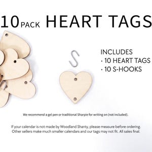 May include: A pack of ten heart-shaped wooden tags, each 1.5 inches, with pre-drilled holes. The image includes ten S-hooks for attaching the tags. Text on the image reads "10 PACK HEART TAGS" and "INCLUDES - 10 HEART TAGS 1.5" - 10 S-HOOKS."
