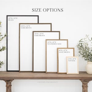 May include: A display of framed signs in various sizes and colors, including black, dark brown, weathered gray, light brown, and natural. The largest sign is 42" x 24", and the smallest is 12" x 8". The text "SIZE OPTIONS" is at the top.