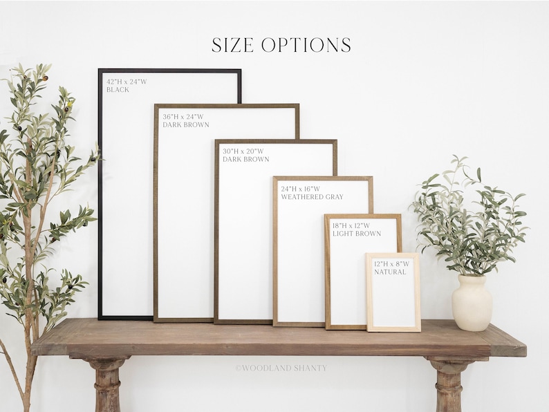 May include: A display of framed signs in various sizes and colors, including black, dark brown, weathered gray, light brown, and natural. The largest sign is 42" x 24", and the smallest is 12" x 8". The text "SIZE OPTIONS" is at the top.