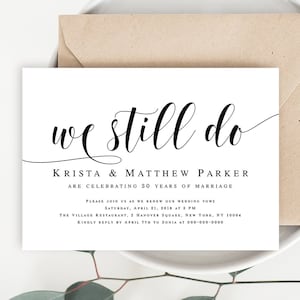May include: A white wedding anniversary invitation with black calligraphy that reads "we still do". The invitation is for Krista & Matthew Parker celebrating 30 years of marriage. The invitation includes the date, time, and location of the event.