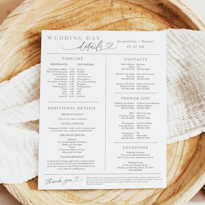 May include: A wedding details card with the text "WEDDING DAY details" and the names "Jacqueline + Daniel" and the date "07.27.XX". The card is on a wooden plate with a white cloth.