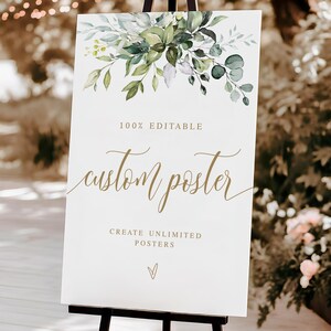 May include: A white sign on a black easel with the words "custom poster" in gold script. The top of the sign features a watercolor design of green leaves and foliage. The text "100% editable" and "create unlimited posters" are also on the sign.