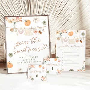 May include: A printable baby shower game with a fall theme. The game is called "Guess the Sweet Mess" and asks guests to guess which candy bar made the sweet mess. The game features a watercolor illustration of pumpkins, leaves, and a baby onesie.