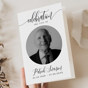 May include: A white folded card with the words "celebration" and "the life of" in script. A black and white photo of a smiling older man is in a circular frame. The name "Patrick Swanson" and dates are below the photo.