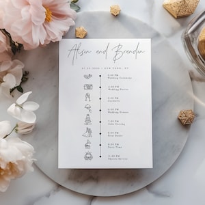 May include: A wedding timeline card with the names Alison and Branden, the date 07.23.2023, and the location New York, NY. The card lists the wedding ceremony, wedding photos, cocktails, wedding dinner, cake cutting, first dance, party time, and shuttle service with corresponding times.