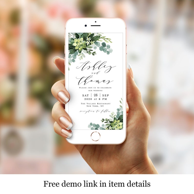 May include: A mobile phone screen displaying a wedding invitation with a green floral design. The invitation reads "Ashley and Thomas" with the wedding date and time: "Sat 26 Sep 2020 at 6 PM". The invitation also includes the location: "The Village Restaurant, New York, NY".