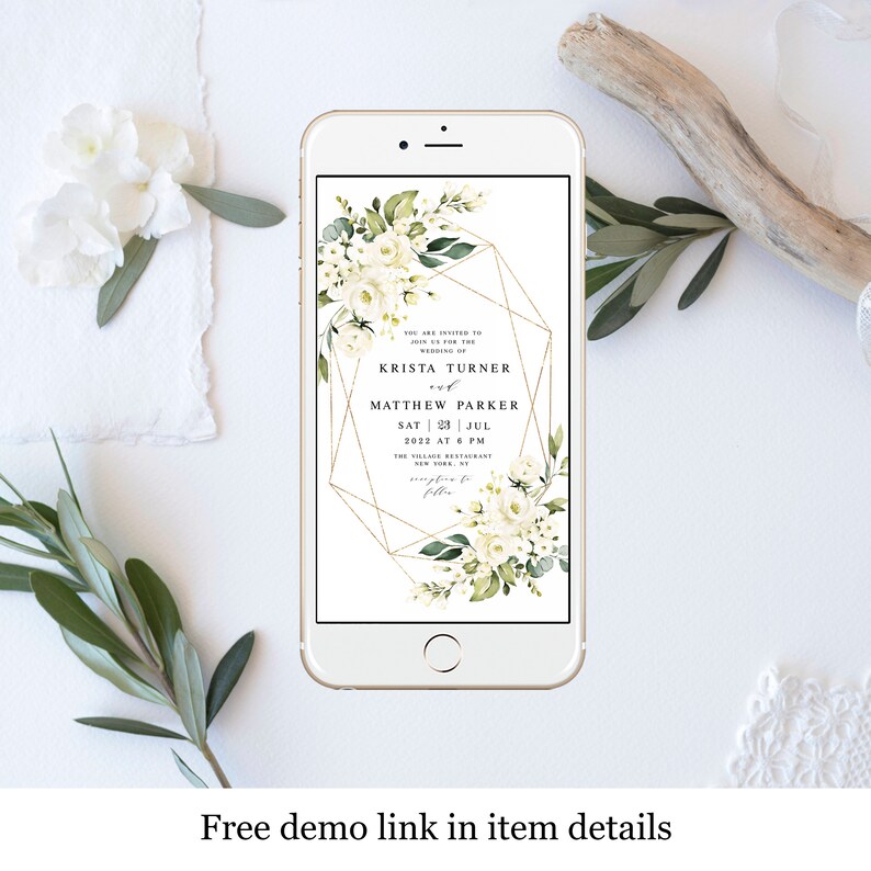 May include: A digital wedding invitation with a white floral design and gold geometric frame. The text reads "You are invited to join us for the wedding of Krista Turner and Matthew Parker Sat 23 Jul 2022 at 6 PM The Village Restaurant New York, NY"