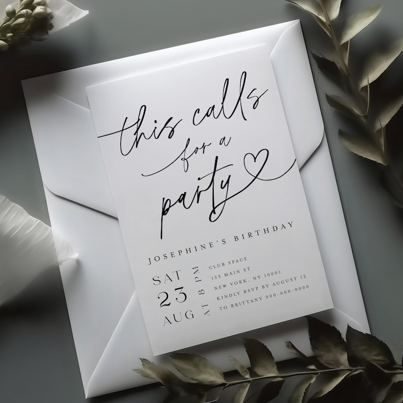 May include: A white invitation card with black script that reads "this calls for a party" and details for Josephine's birthday. The card is inside a white envelope, with a sprig of greenery in the background.