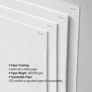 May include: A stack of white paper sheets with varying weights, labeled 230 gsm, 330 gsm, 430 gsm, and 500 gsm. The paper has a coated silk or matte finish and is FSC-certified for sustainability. The paper weight is 300/350 gsm.
