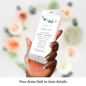 May include: A smartphone screen displaying a wedding rehearsal dinner invitation with a green watercolor floral design. The invitation reads "Let's rehearse" with the names Krista and Matthew, the date Saturday, June 25, 2022, and the times for the rehearsal and dinner.