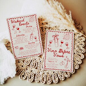May include: Two red and white cards with a handwritten design. The first card says "Weekend Events" and lists a schedule of events for Friday, Saturday, and Sunday. The second card says "Vino Before Vows" and includes the date August 24-26.