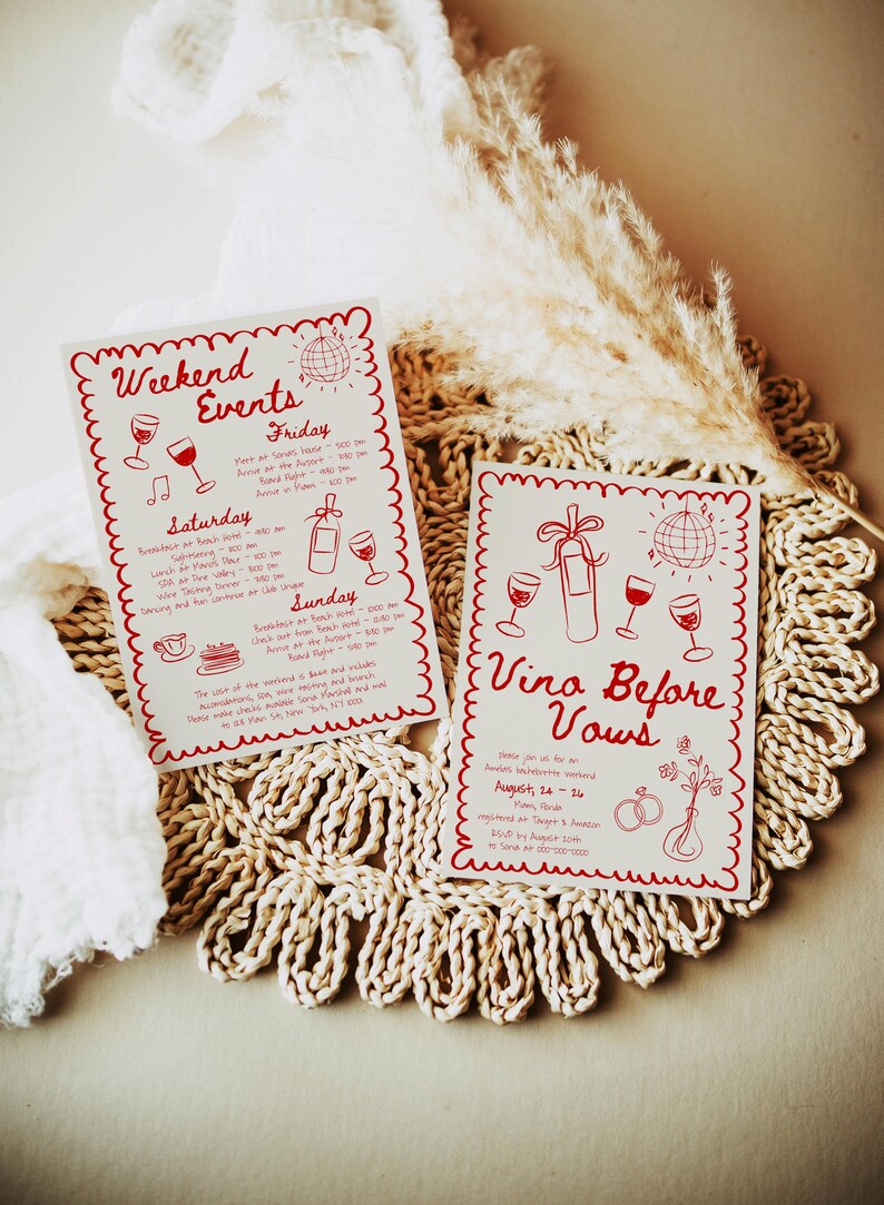 May include: Two red and white cards with a handwritten design. The first card says "Weekend Events" and lists a schedule of events for Friday, Saturday, and Sunday. The second card says "Vino Before Vows" and includes the date August 24-26.
