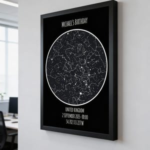 May include: Black framed print with a white star map in a circle. The text "MICHAEL'S BIRTHDAY" is at the top. Below the star map, the text reads "UNITED KINGDOM 2 SEPTEMBER 2025 - 00:00 54.702.113.227.W".