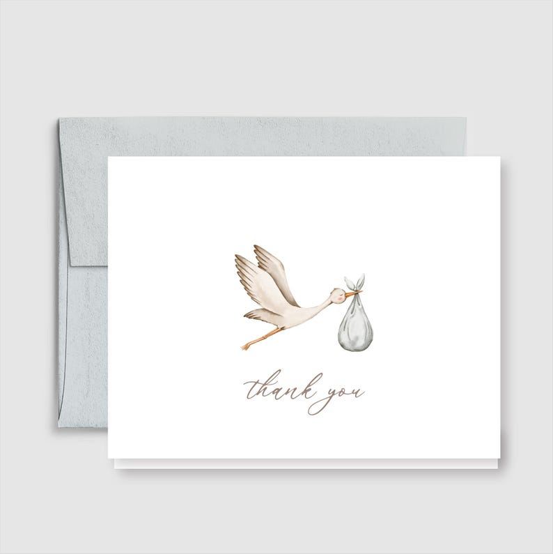 May include: A white greeting card with a watercolor illustration of a stork carrying a bundle. The words "thank you" are written in a delicate script below the stork. The card is paired with a light gray envelope.