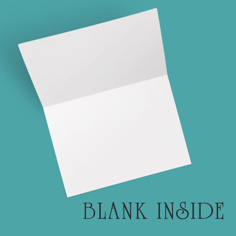 May include: A white, folded greeting card with the text "BLANK INSIDE" in black script. The card is open, revealing a blank interior, set against a teal background. Ideal for personalized messages.