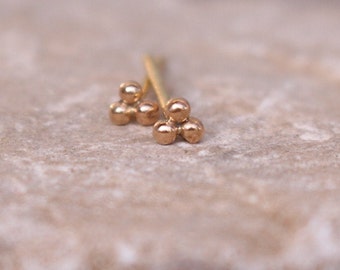 14 k yellow gold heart stud earrings