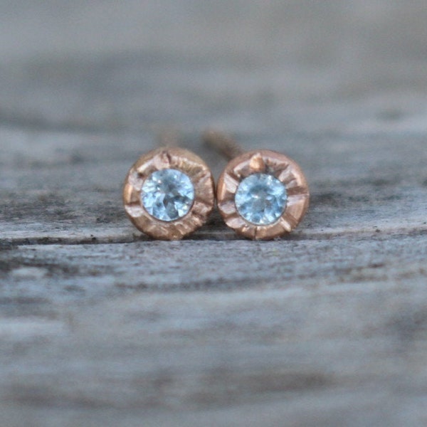 14 k rosegold stud earrings with sky blue topaz