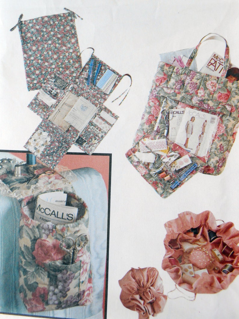 May include: A set of five floral fabric bags with various pockets and compartments. The bags are filled with sewing supplies, including scissors, thread, and fabric scraps. The bags are perfect for organizing and storing sewing supplies.