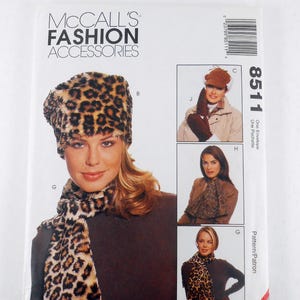 May include: McCall's Fashion Accessories pattern featuring a leopard print hat and scarf set. The pattern includes images of the accessories and the number 8511. The cover shows a woman wearing the hat and scarf.