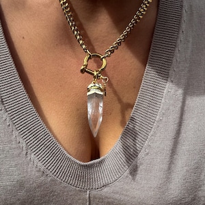 Gold Curb Chain Crystal Point Necklace: chunky quartz pendant with shackle clasp