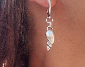 Silver Shell Hoop Earrings: matte plated 17mm hoops, small conch charm dangles