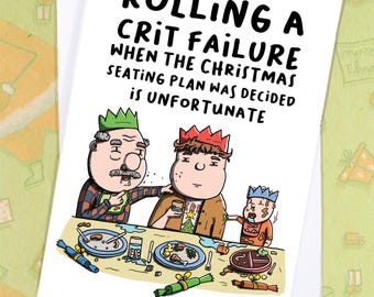 May include: A white greeting card with the text "ROLLING A CRIT FAILURE WHEN THE CHRISTMAS SEATING PLAN WAS DECIDED IS UNFORTUNATE." The card features a cartoon illustration of three people at a Christmas dinner table.