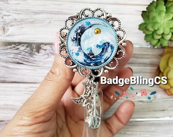Ocean wave badge reel holder clip moonlight sail World traveler moon north star waves adventure To travel is to live beach eye of the storm