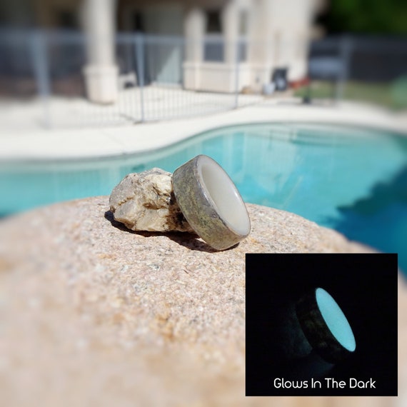 Glowing stone ring in best sale water