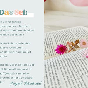 May include: A handmade bookmark with dried flowers and a pink tassel rests on an open book. The bookmark features a vibrant pink flower and delicate leaves. The text "Das Set" is visible in the image.