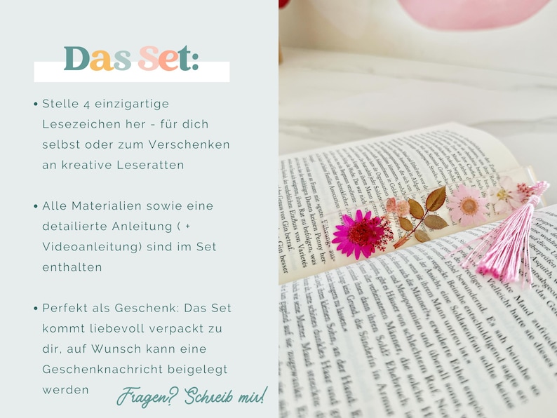 May include: A handmade bookmark with dried flowers and a pink tassel rests on an open book. The bookmark features a vibrant pink flower and delicate leaves. The text "Das Set" is visible in the image.