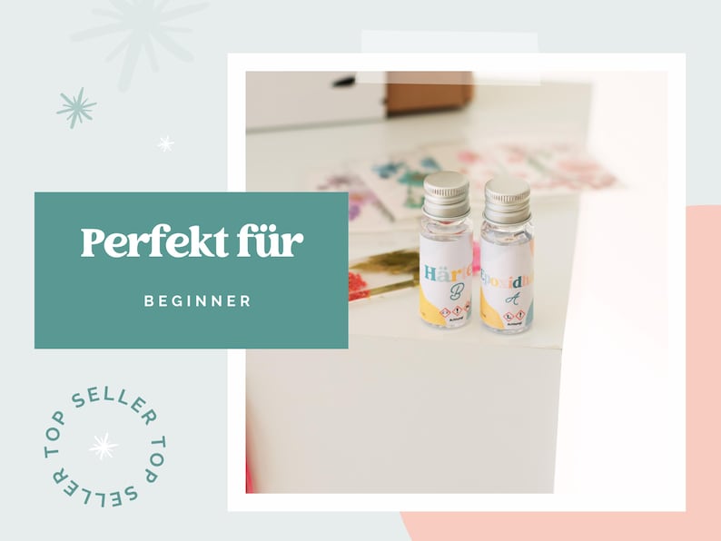 May include: Two small glass bottles with silver lids and labels. The labels have text and colourful accents. The image also includes a teal box with the words "Perfekt f&uuml;r" and "Beginner".