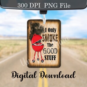 May include: A red and black car air freshener with a woodgrain background. It features a cartoon grill with smoke and the text "I Only Smoke The Good Stuff".