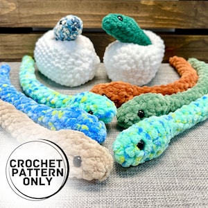 May include: Crochet pattern for a set of colorful, plush worm toys. The worms are in various colors, including green, blue, brown, and orange. The pattern includes instructions for crocheting the worms and their eggs.