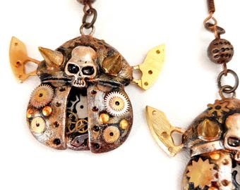 Orecchini Steampunk coleotteri meccanici con teschio. Gioielli Steampunk fatti a mano