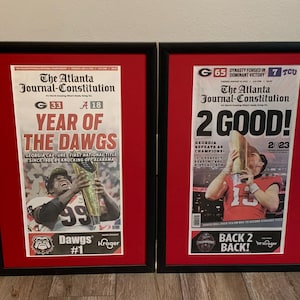 Georgia Bulldogs - 2022 And 2023 College Football National Champions - Framed & Matted Front Page Newspaper Set